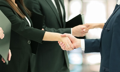 concept of cooperation.handshakes when meeting business partners