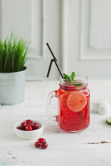 Fresh drink lemonade orange strawberry cranberries