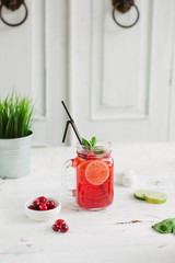 Fresh drink lemonade orange strawberry cranberries