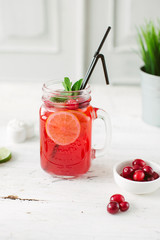 Fresh drink lemonade orange strawberry cranberries