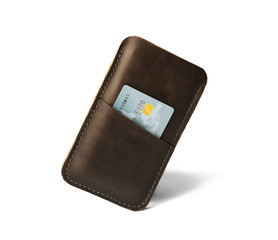 Leather case for mobile phone and credit card on white background