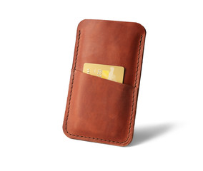 Leather case for mobile phone and credit card on white background