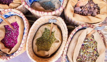Various dry tea leaves on marketplace