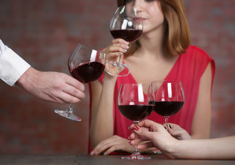 People with wine glasses at restaurant