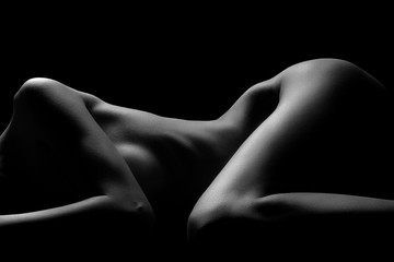 Sexy body nude woman. Naked sensual beautiful girl. Artistic black and white photo. - obrazy, fototapety, plakaty