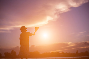 silhouette of a happy children and happy time sunset 