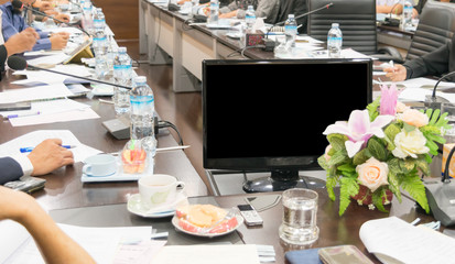 People attend business meetings in the conference room.