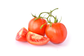 Fresh red tomatoes on white background