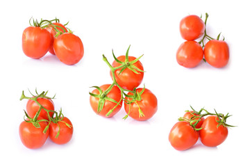 Fresh red tomatoes on white background