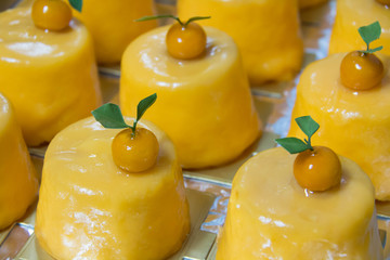  spong orang cake with orang  glaze on top