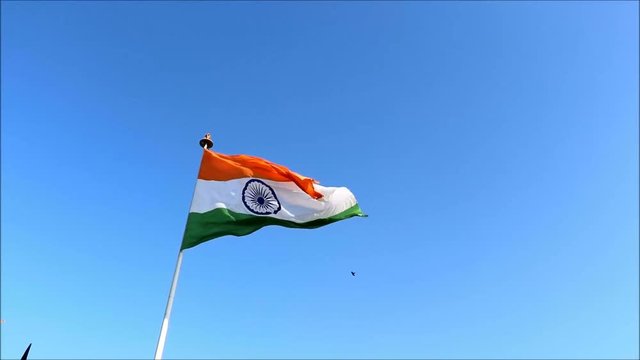 Tiranga (Tri coloured) the national flag of India hoisted in central park, Rajiv Chowk, New Delhi, India
