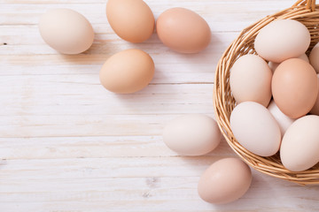 eggs on white wooden background