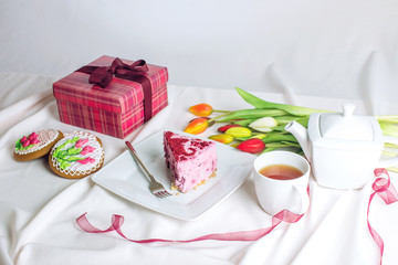 Cute greeting card sweet with cup of coffee and tulips