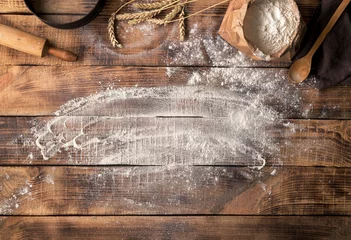 Foto auf Acrylglas Baker workplace with flour, top view with copy space © kucherav