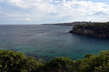 Fototapeta premium Eastern coastal view at Gordon Bay. Coogee and Maroubra beach on a cloudy day in summer time.