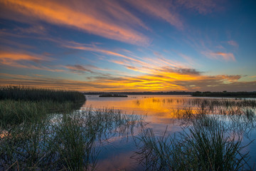 Fototapeta premium Sunet from Fitz roy lake in Southern highlands NSW.