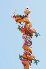 Chinese style dragon statue in blue sky - 140588020