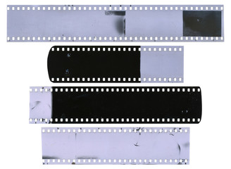 Old, used, dusty and scratched celluloid film strips