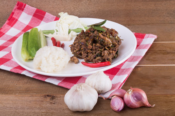 Spicy Thai minced beef salad with sticky rice