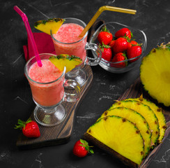 Fruit cocktail smoothie with strawberries and pineapple
