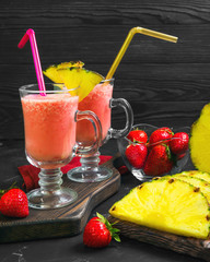 Fruit cocktail smoothie with strawberries and pineapple