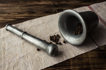 mortar and pestle with pepper