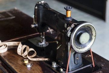 vintage sewing machine on dark background