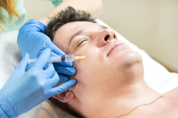 Man passes a course of mesotherapy clinic 