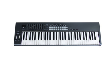 synthesizer Keyboard with Fader And Touch Pad on white background