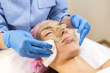 Process cosmetic mask of massage and facials in beauty salon 