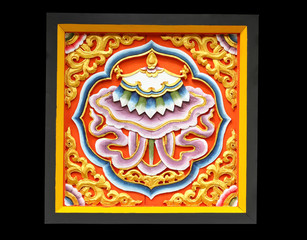 Colorful of wood carving traditional Bhutan style on black background