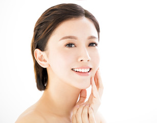 Fototapeta premium closeup young smiling woman face isolated on white