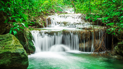 Landscape photo, Waterfall in autumn forest at Erawan waterfall National Park, Thailand