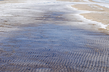 frozen sand dunes at the shore of Baltic sea