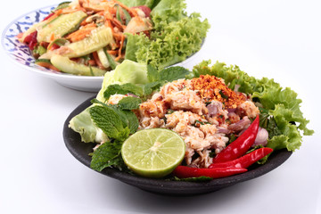 Spicy salad with cucumber served with spicy crab salad.
