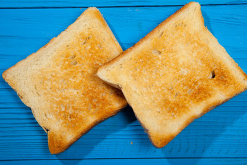 Toast on a wooden blue background