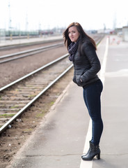 Pretty woman waiting for a train