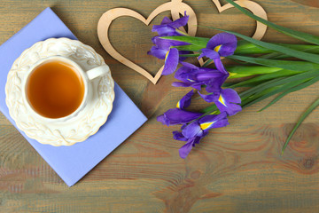 Narcissus, tea and book
