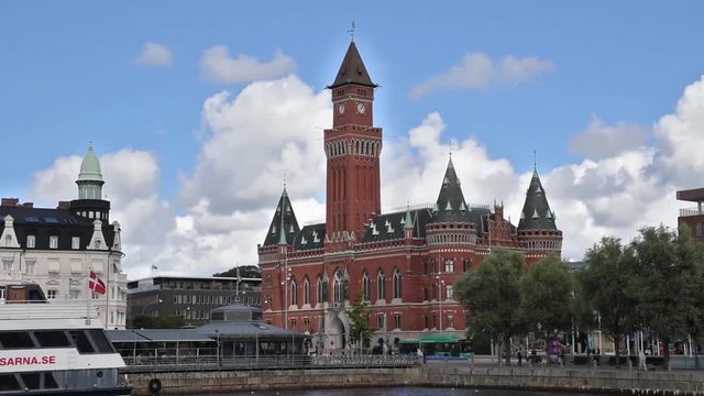 A street view of the Town Hall of Helsingborg time lapse to show the traffic and people movement about the area.