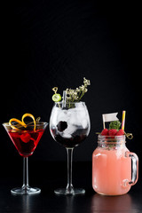 selection of fine cocktail drinks on bar counter various glass and shape decoration fruit herb flower