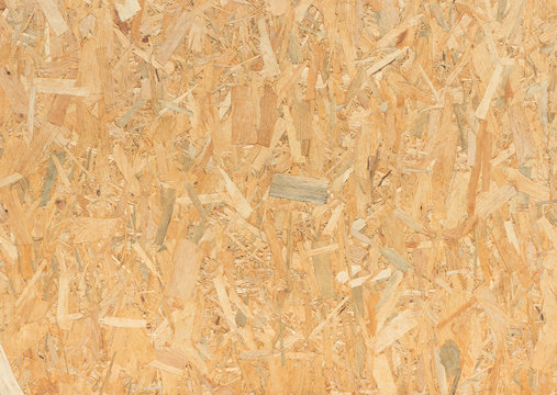 Fototapeta pressed wooden panel background, seamless texture of oriented strand board - OSB wood