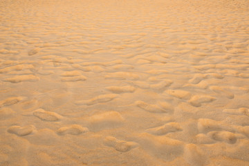 Obraz premium texture of sand pattern on a beach in summer