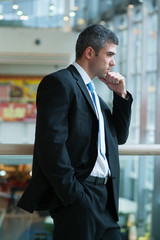 Businessman with serious expression looking off camera