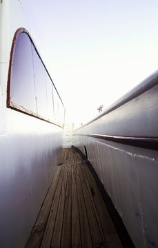 Narrow passage on the deck of the yacht in perspective