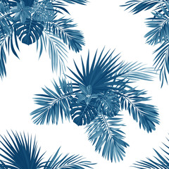 Blue indigo tropical pattern with jungle plants. Seamless tropical fabric design with phoenix palm leaves.