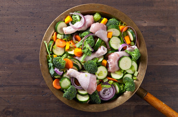  raw vegetables with chicken drumsticks