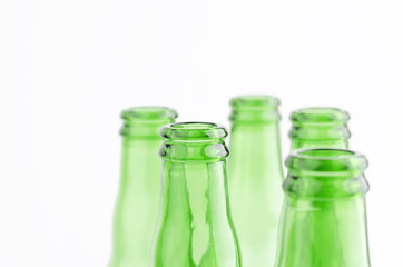 Green Empty Beer Bottles On White Background Closeup