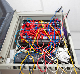 Tangled wires in server room at television station