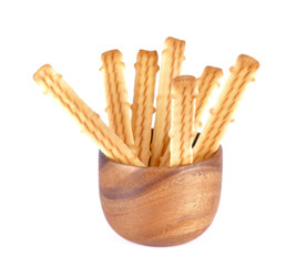 bread sticks isolated in  wooden bowl on a white background