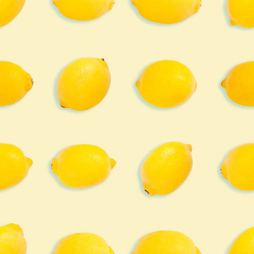 Seamless background or pattern with Fresh yellow lemons